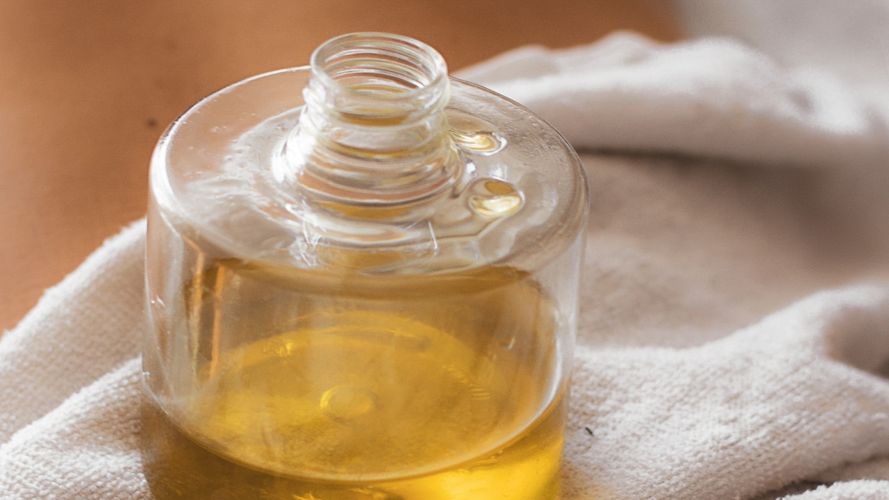Warm the oil slightly