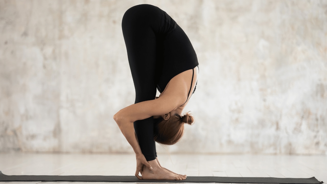 3. Hasta Padasana (Hand to Foot Pose)
