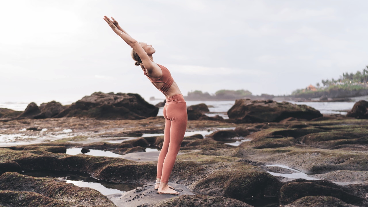 2. Hastauttanasana (Raised Arms Pose)