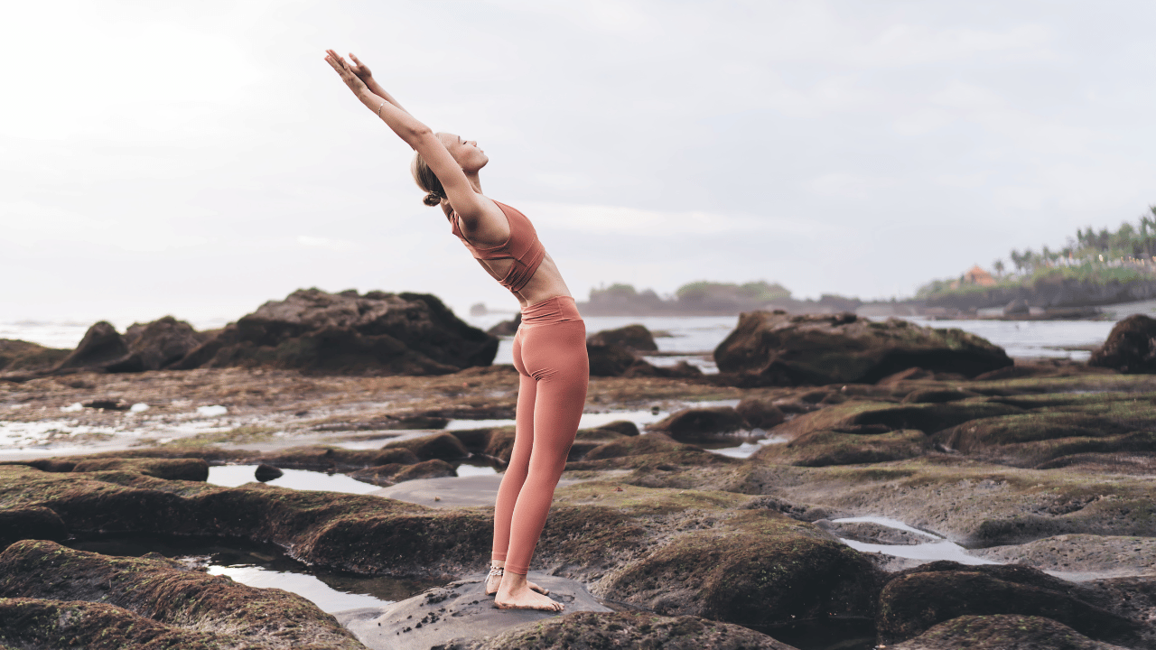 2. Hastauttanasana (Raised Arms Pose)