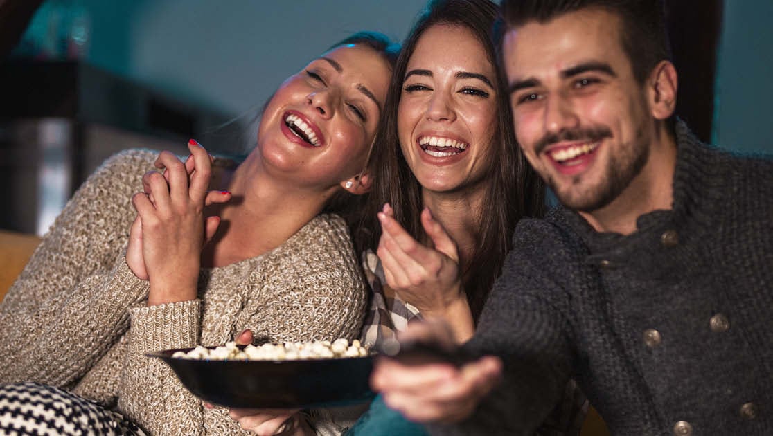 Group of friends enjoying movie night