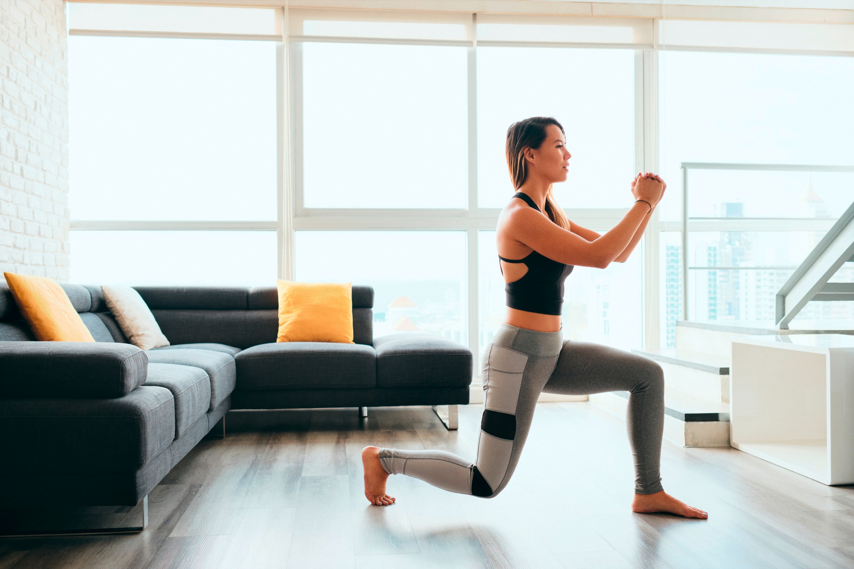 Woman doing a lunge exercise. 
