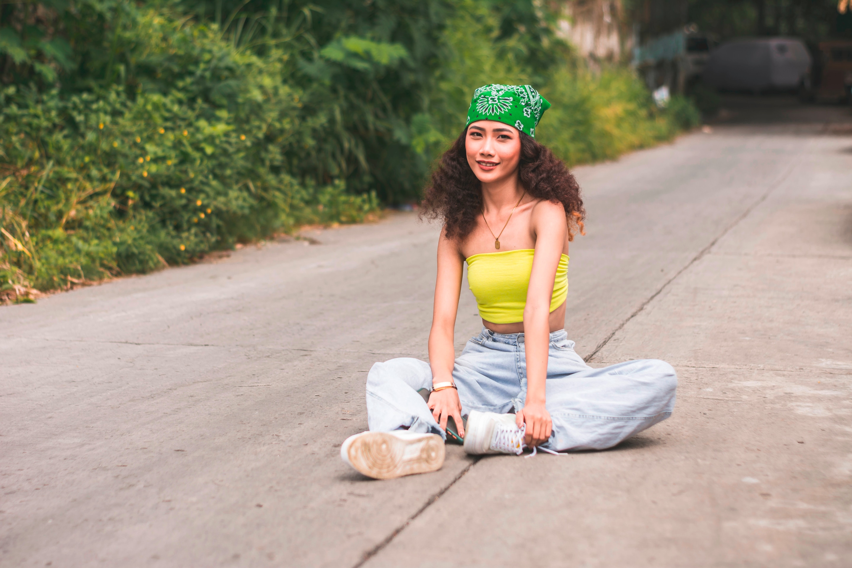 Woman with coily hair.
