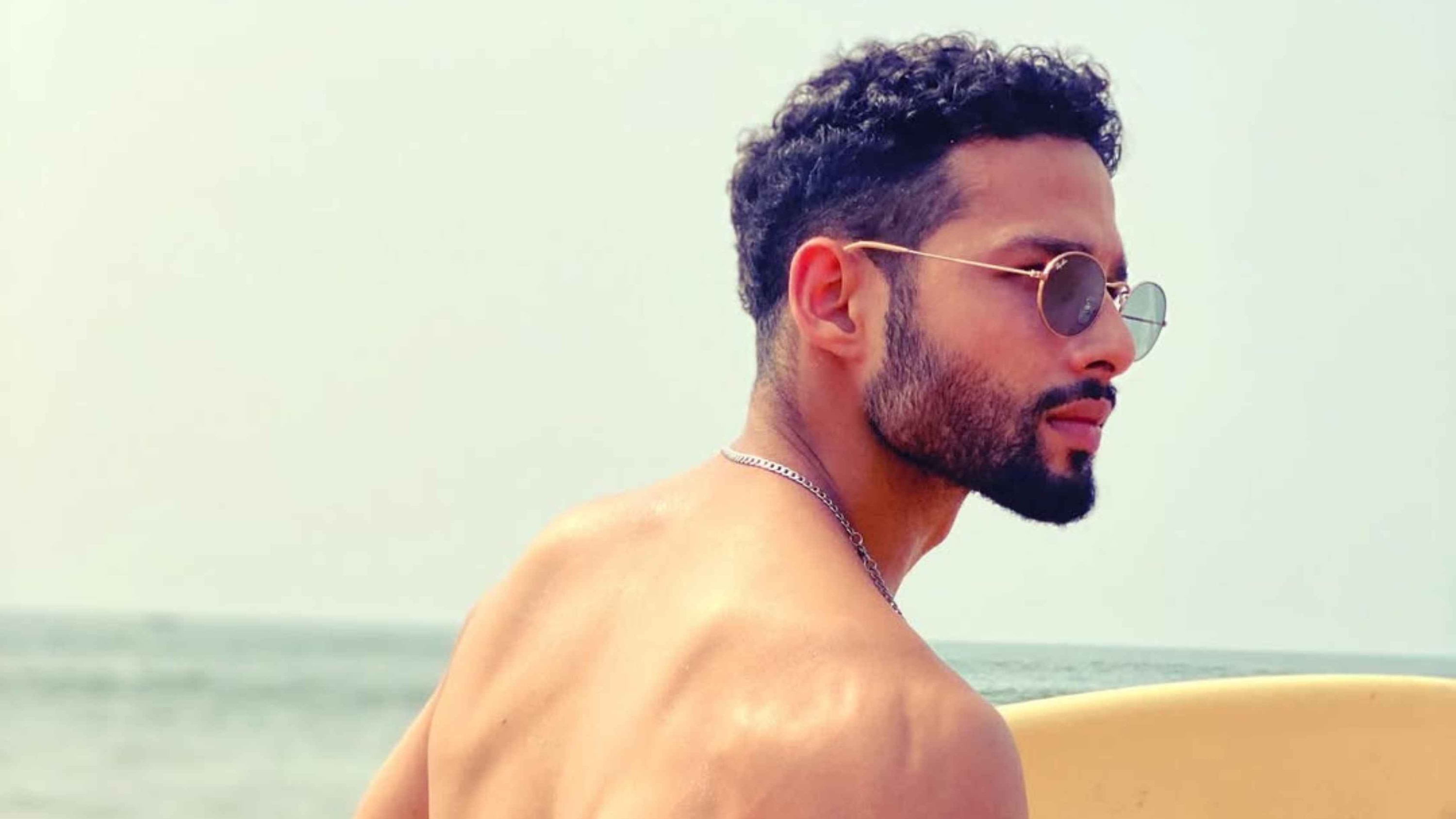 6. Curly Medium Fade