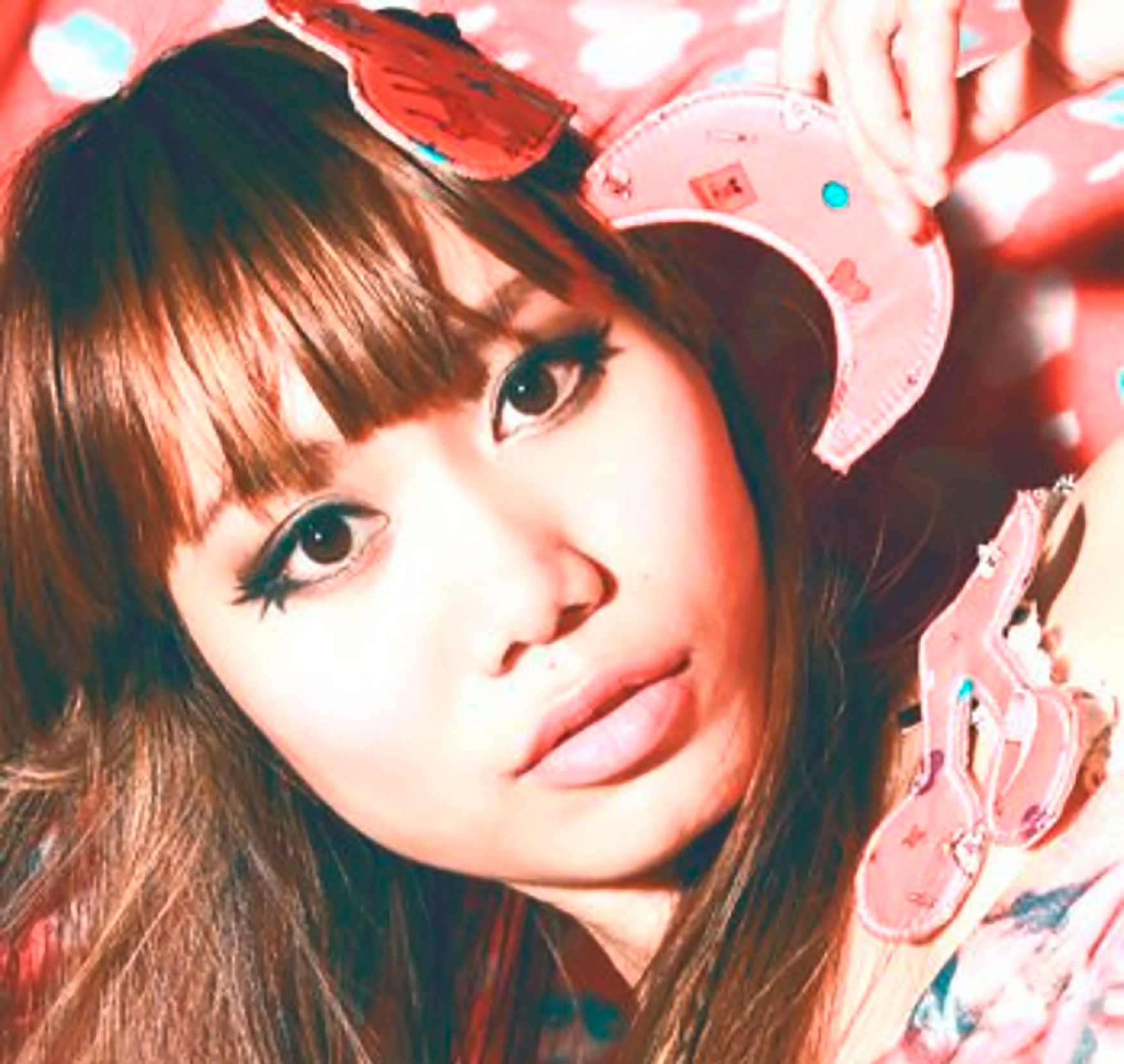 Makeup artist wearing smokey eye look.