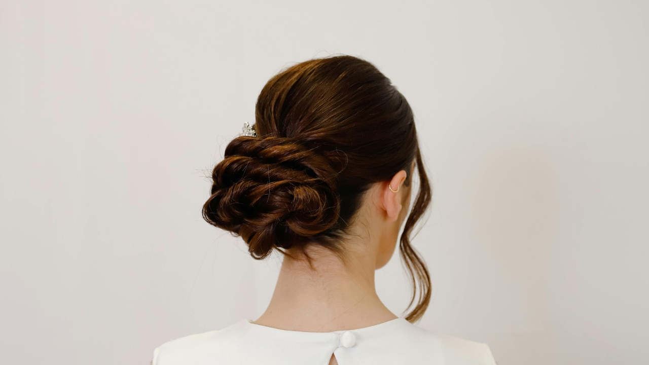 Classic Low Bun with Face Framing Strands