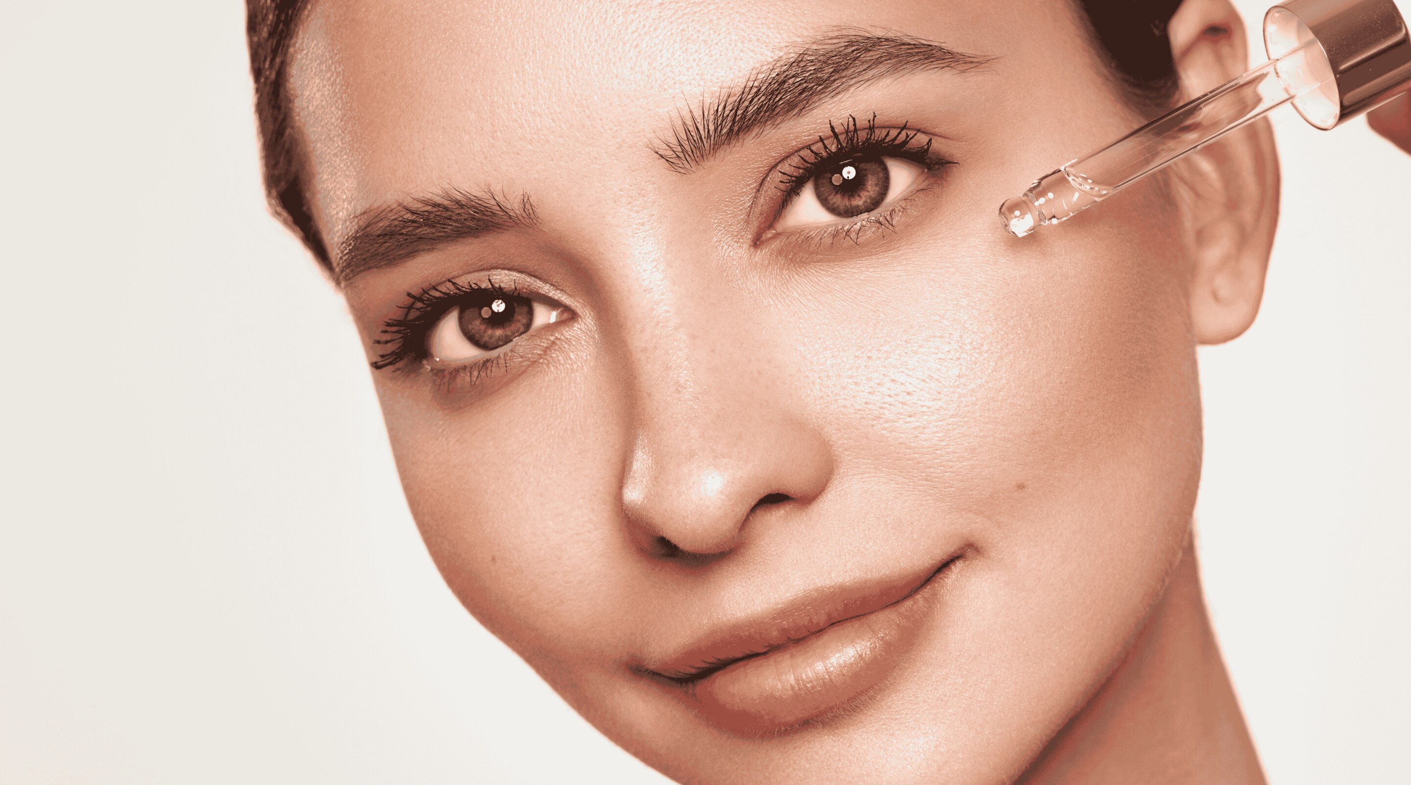 Woman applying kojic acid cream to her face safely