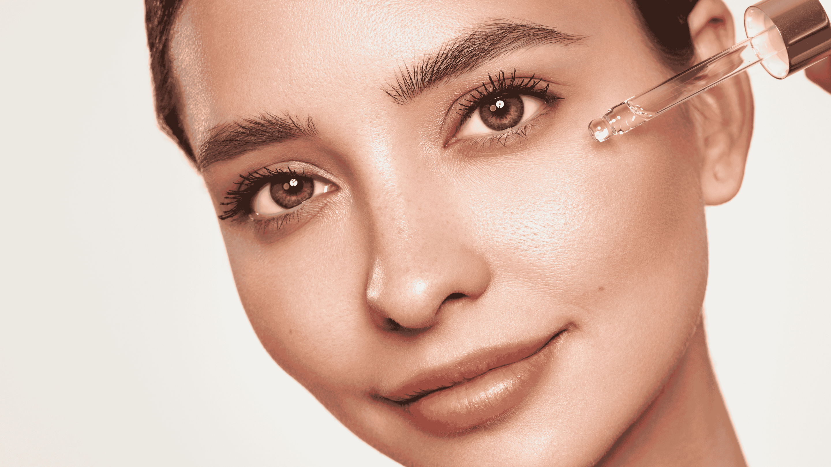 Woman applying kojic acid cream to her face safely