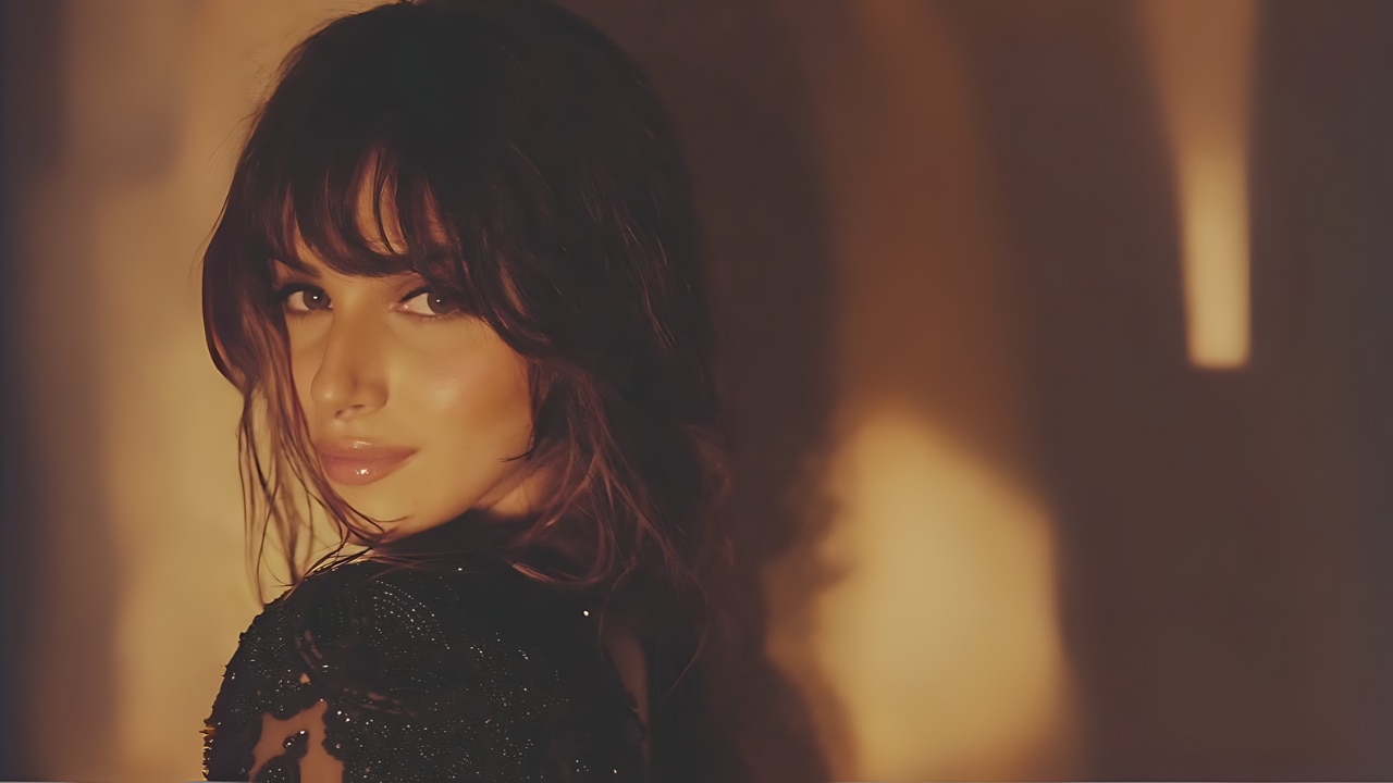 17. Textured Feather Cut with Bangs