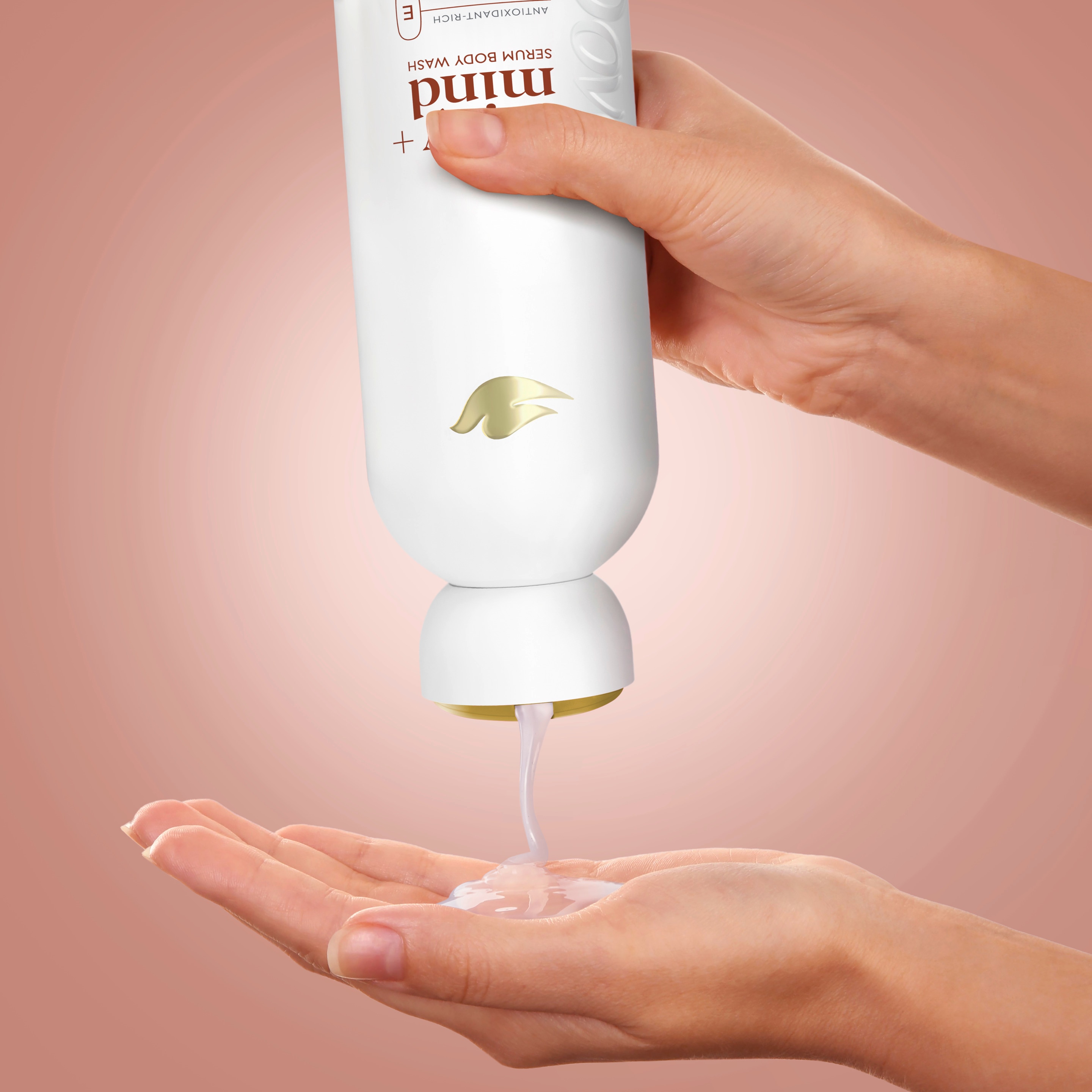 Dove Body and Mind - Drama Free Holding of bottle while serum is pored 