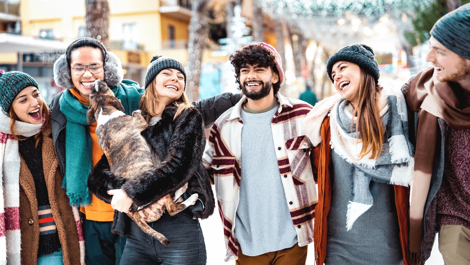Group of friends celebrating the Holidays together with no Holiday stressors