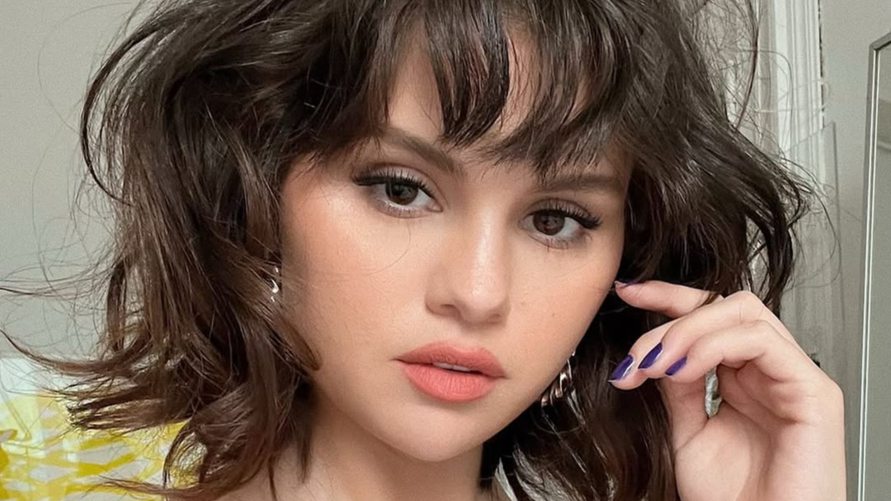 The Chin-Length Shag with Curtain Bangs: