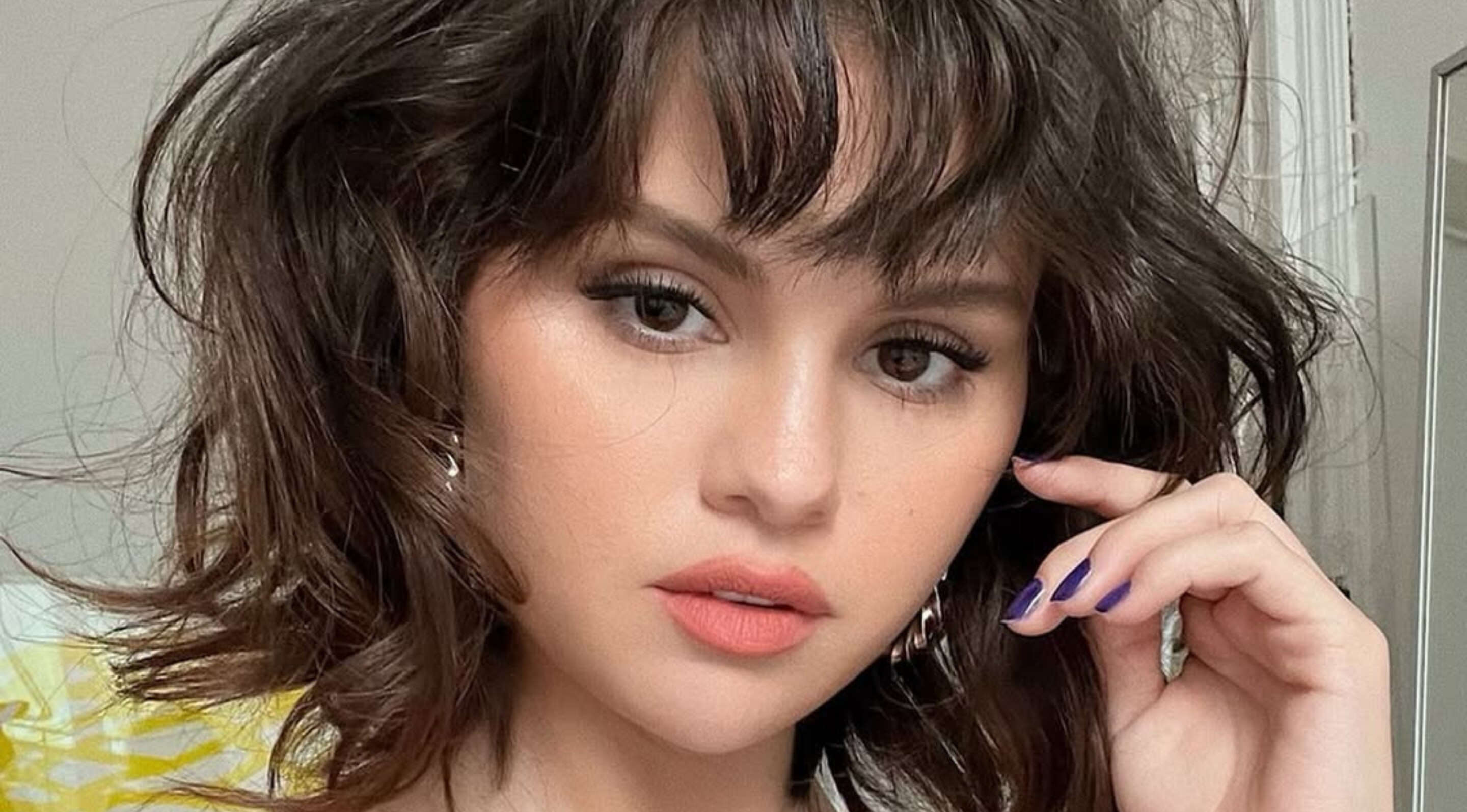 The Chin-Length Shag with Curtain Bangs: