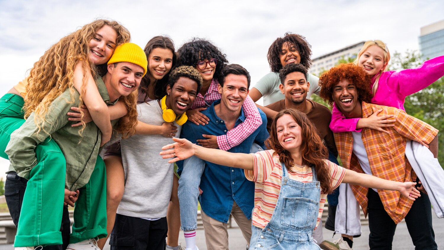Happy group of young people. Some with the ABCC11 gene