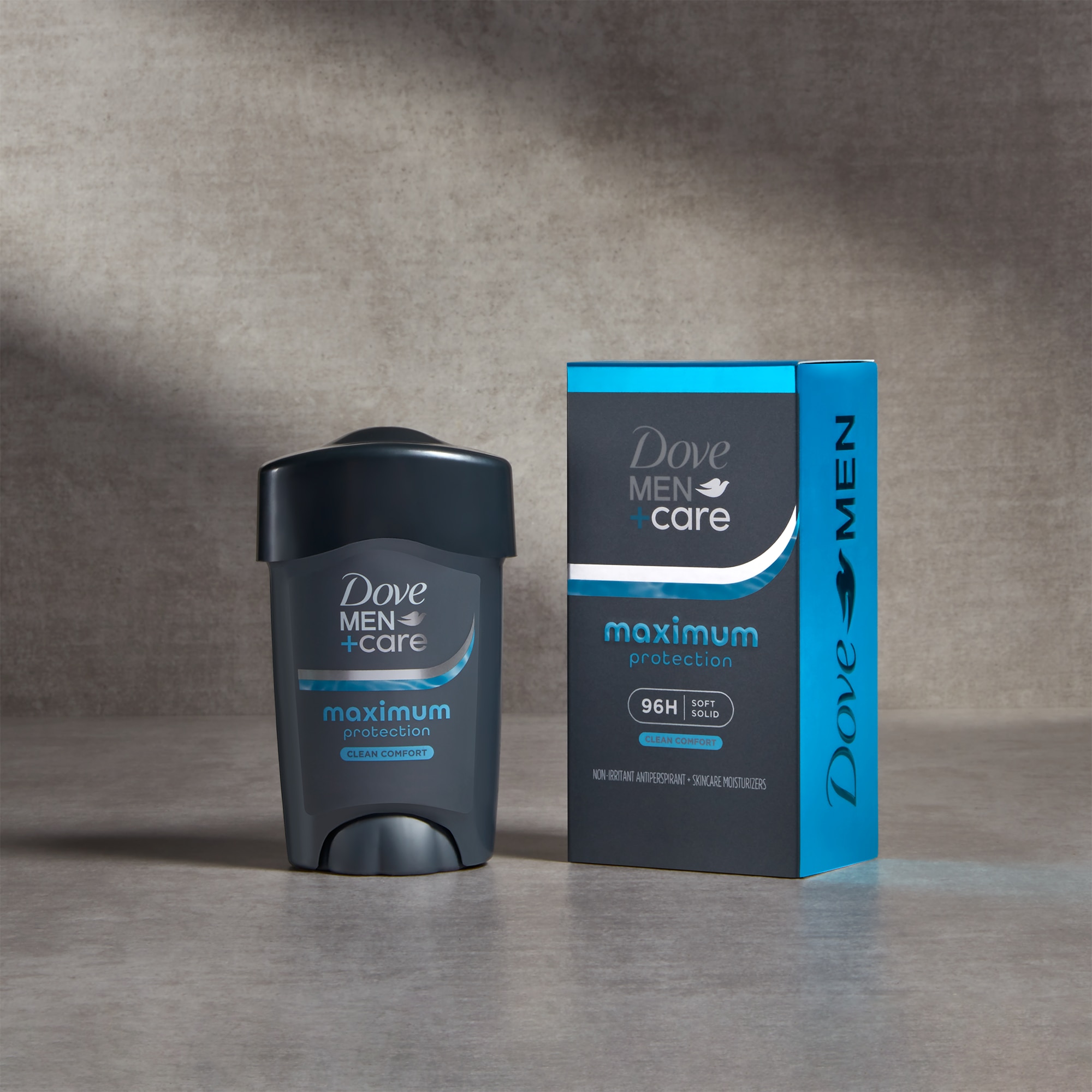 Pack of maximum protection ocean breeze solid antiperspirant stick standing against a grey background with product box next to it 