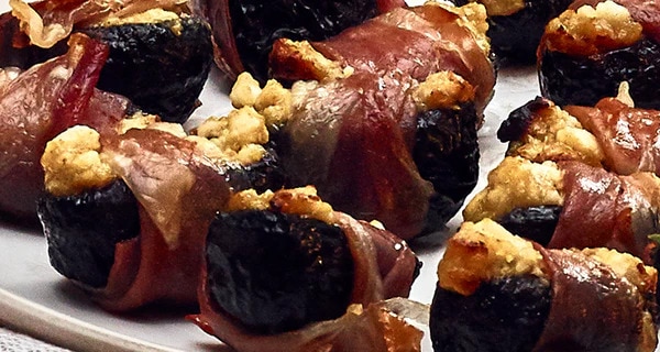 Prunes stuffed with Goats Cheese and wrapped in Bacon or Parma Ham