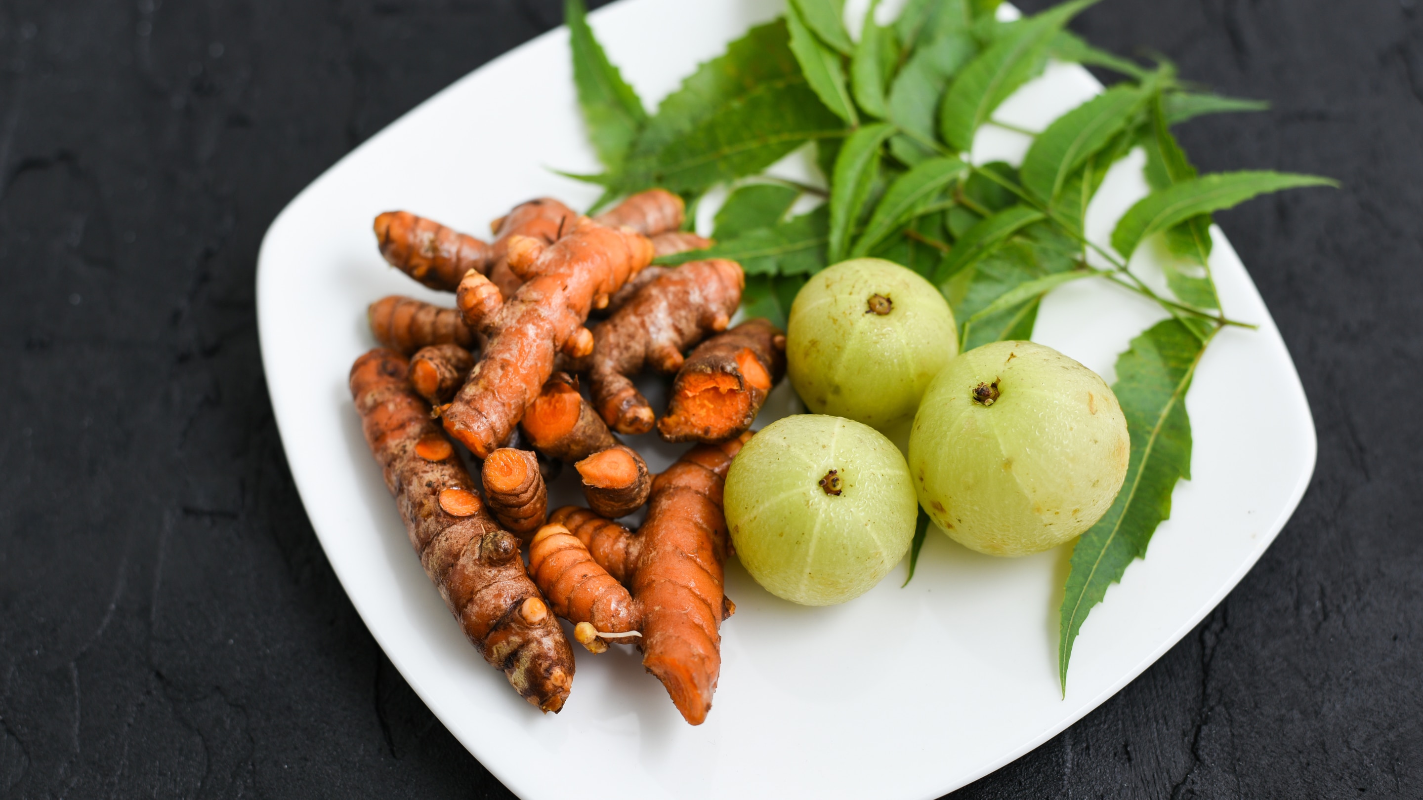 2. Amla Juice & Turmeric Spot Treatment