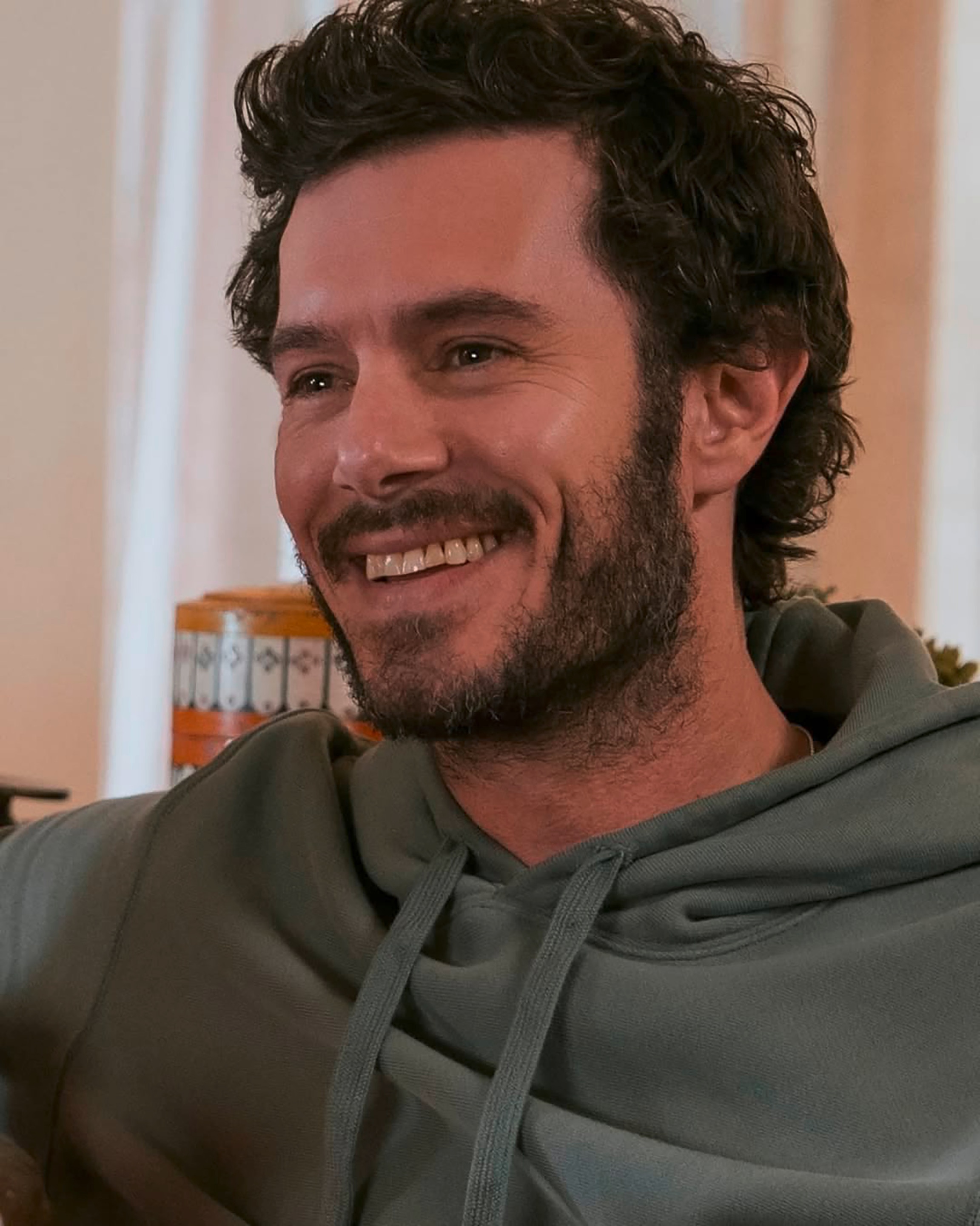 Actor Adam Brody in a laidback hoodie.