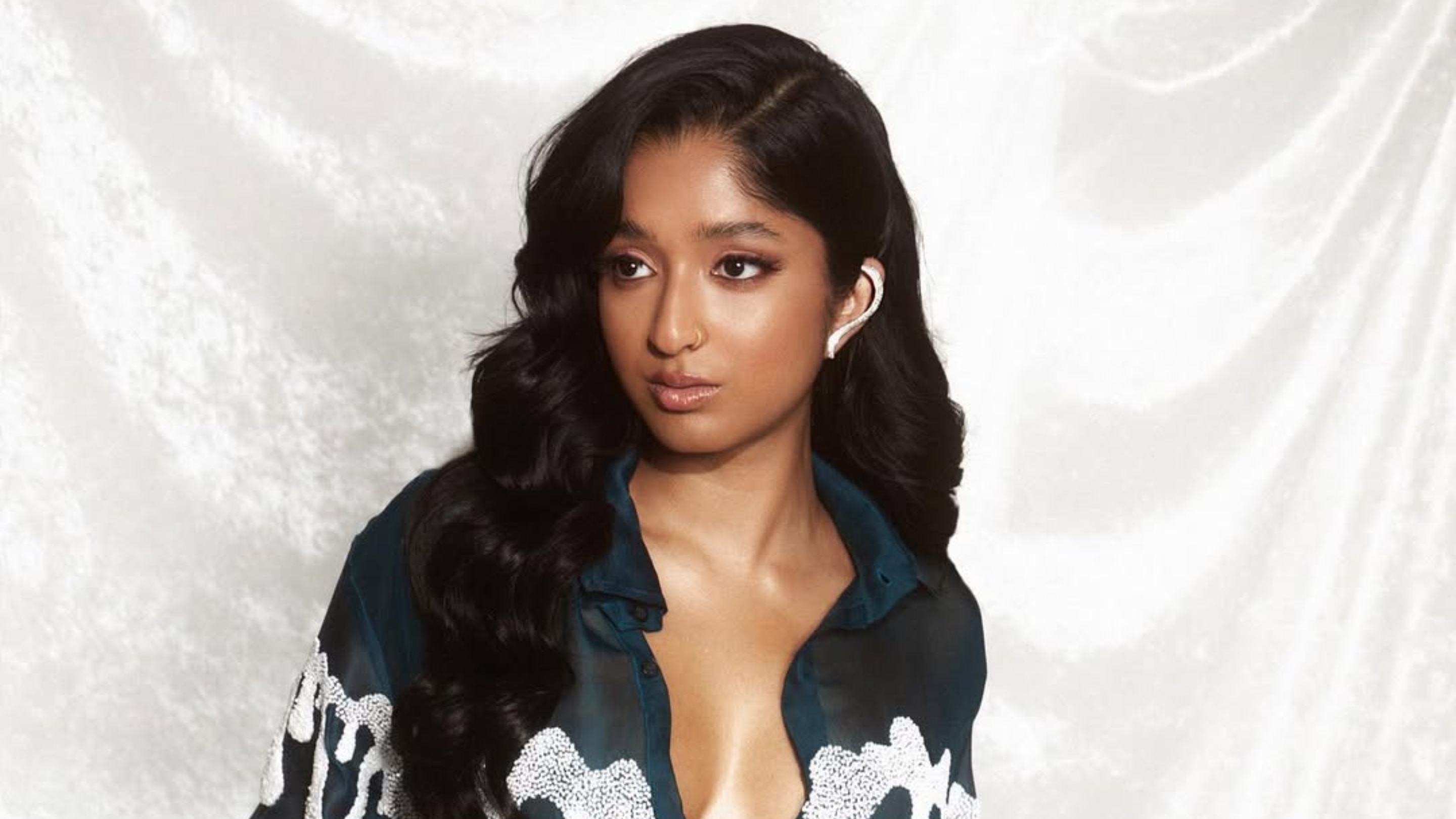 2. Long Soft Curls with Side Part