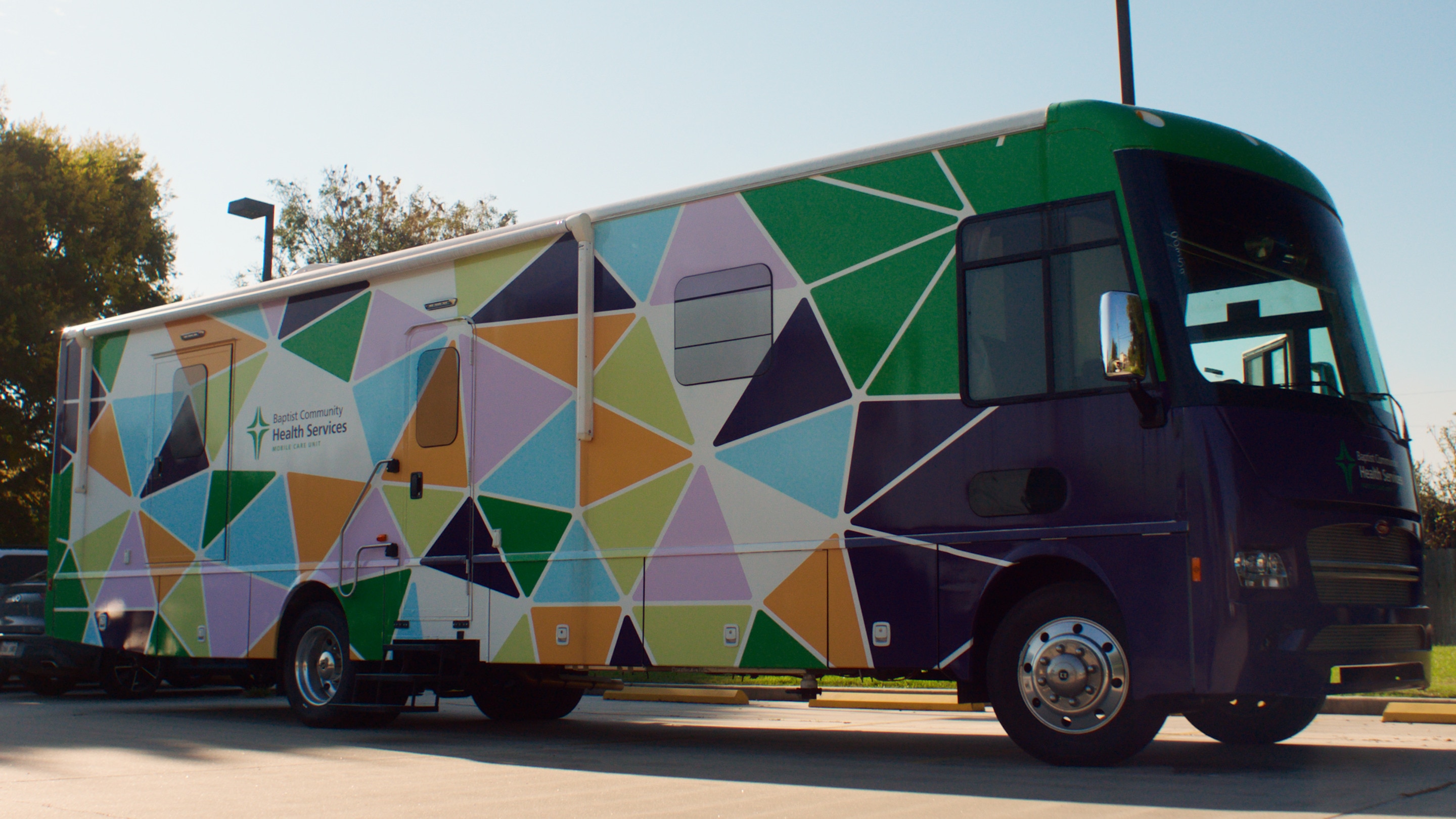 A colorful van that serves as a mobile health clinic