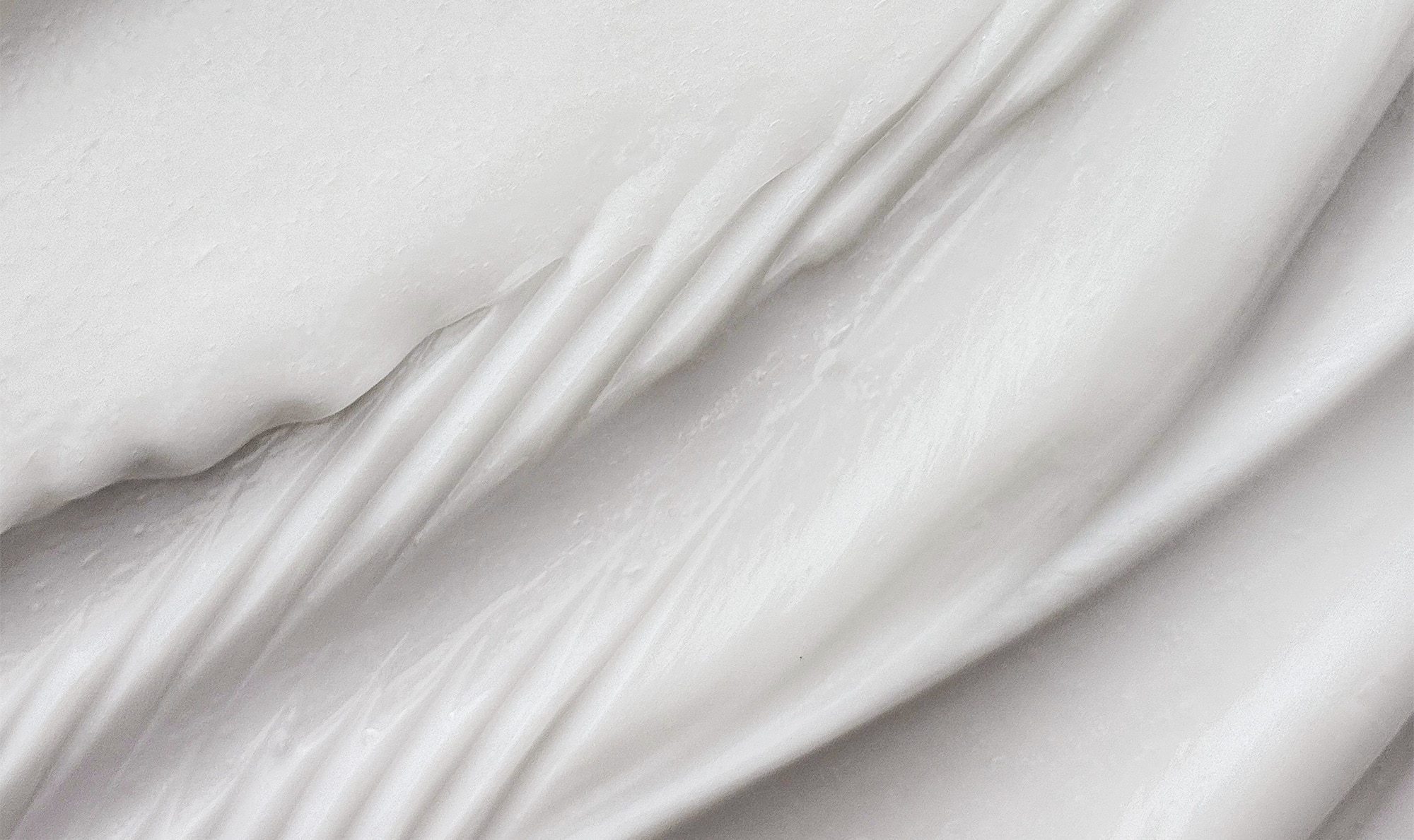 Close-up texture shot of a conditioner product