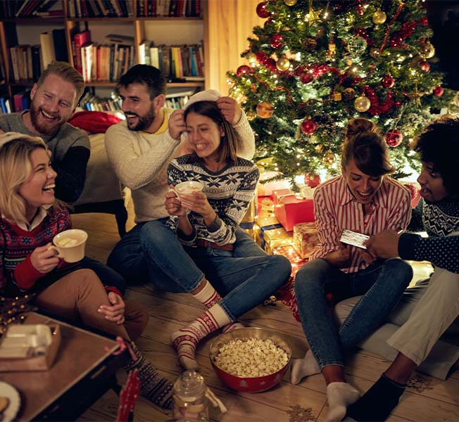 Group of friends enjoying celebrating the holidays