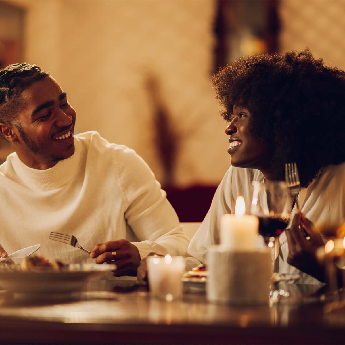 Happy couple enjoying a meal together