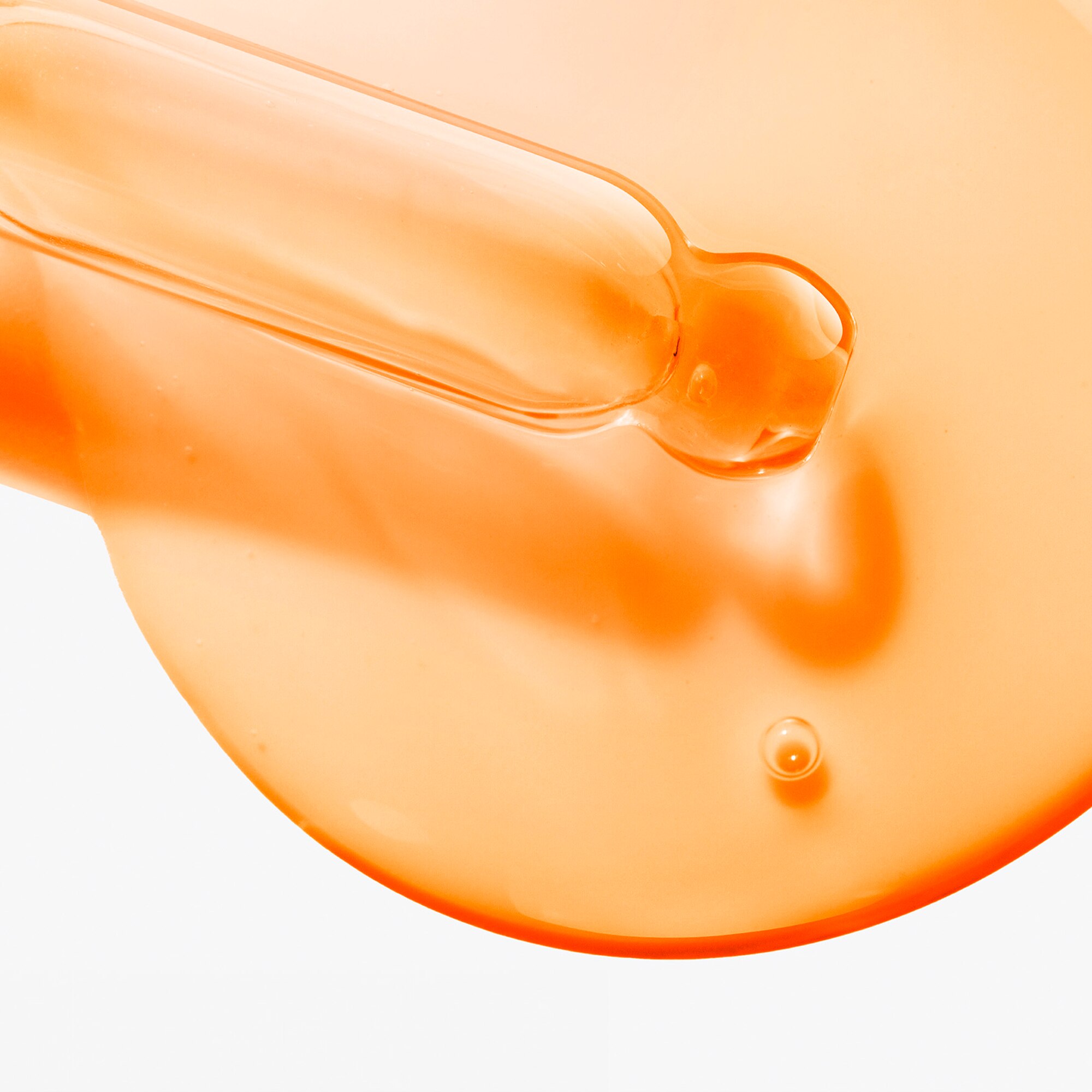 Image of orange serum product swatches