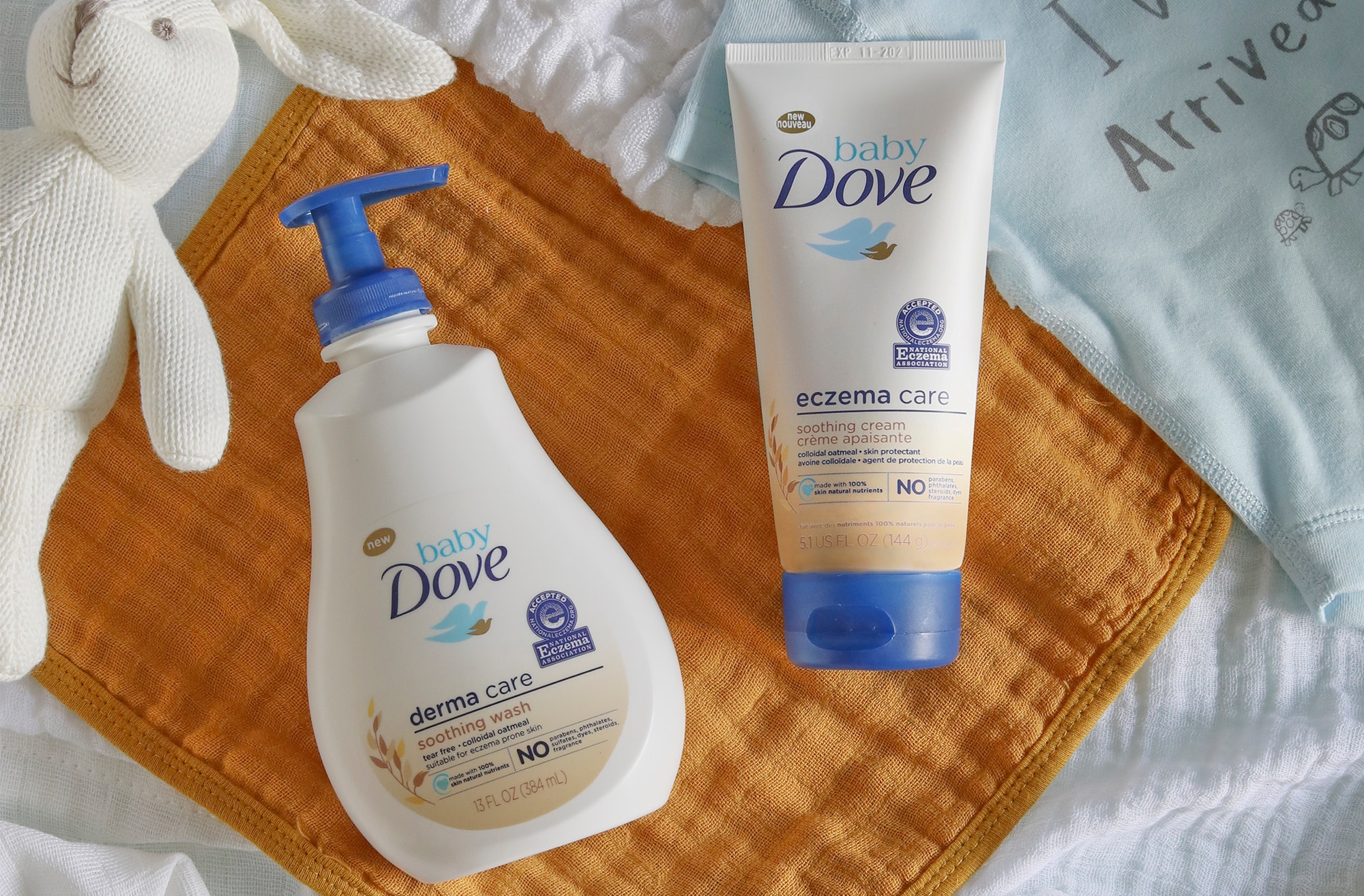 Image of two Eczema Care product bottles laid on an orange blanket