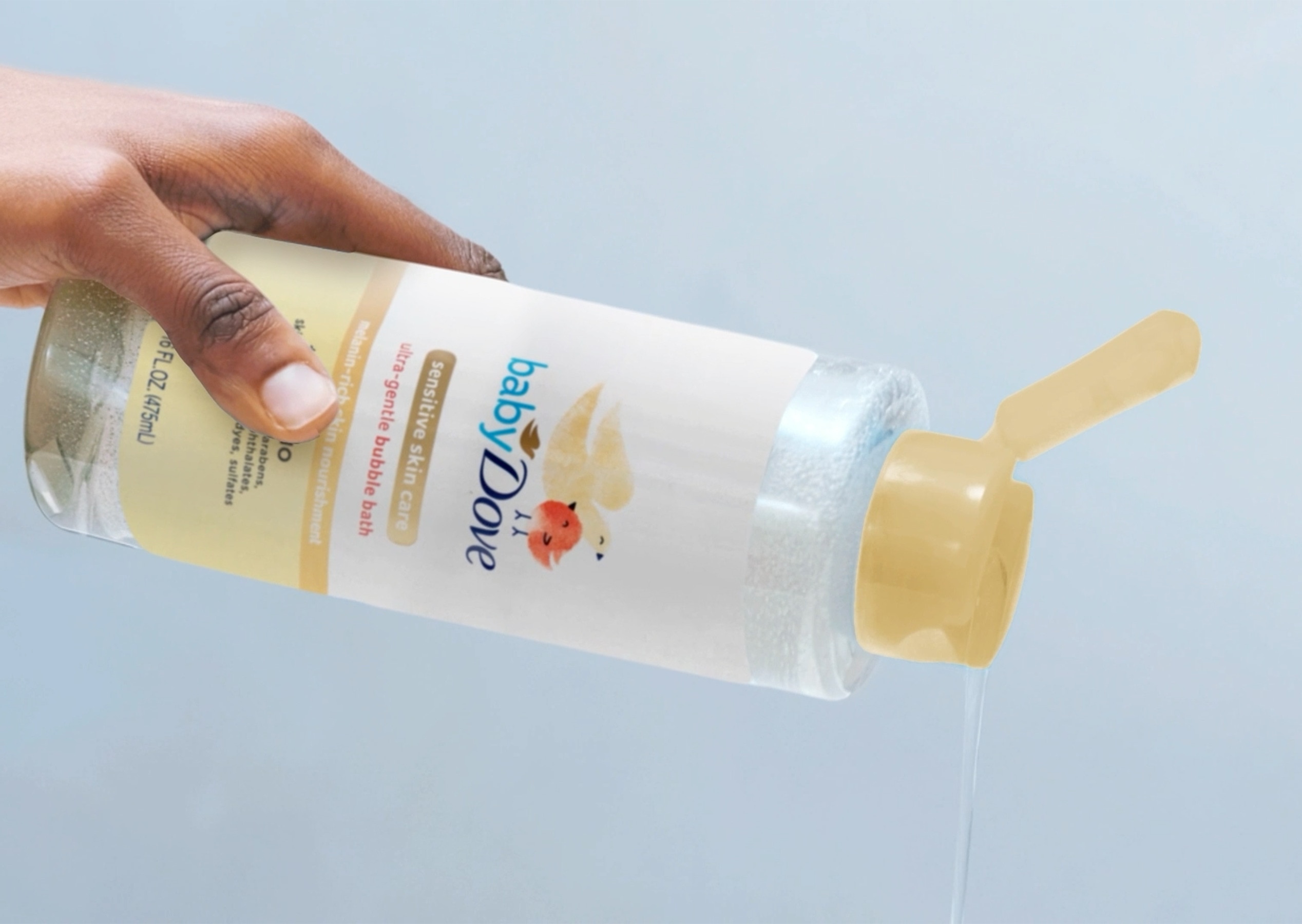 Image of a hand pouring a Baby Dove bath product out the bottle against a gray background