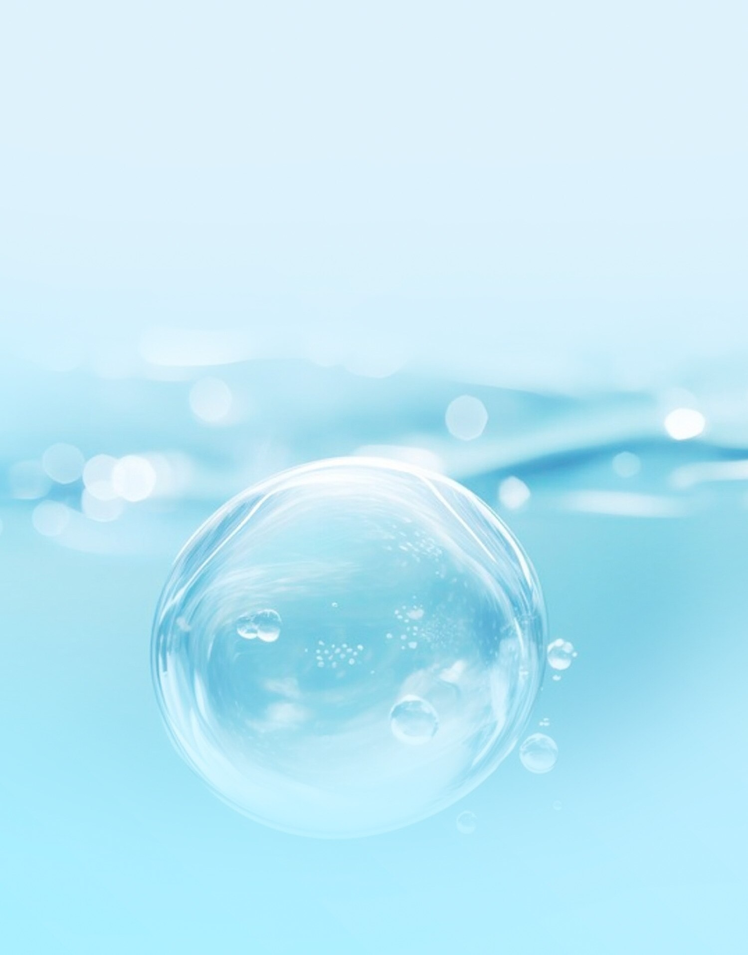 Close up image of a liquid, there is a large bubble in the forground