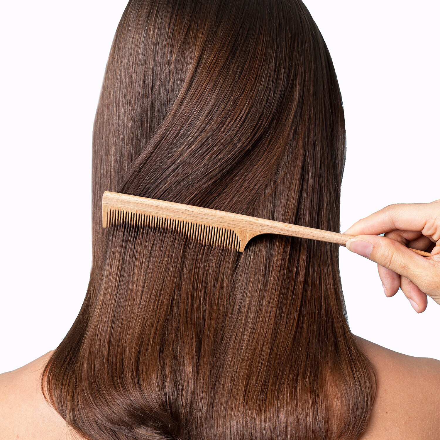 Woman combing her hair