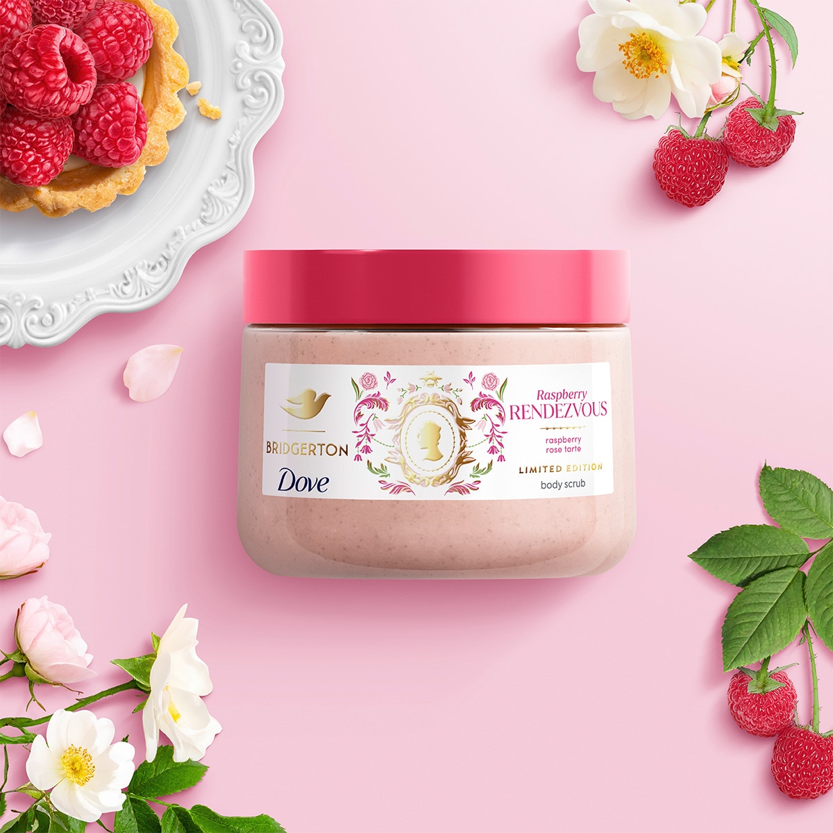 Raspberry rendevous body scrub against a pink background with rasberrys and flowers in the corners. 