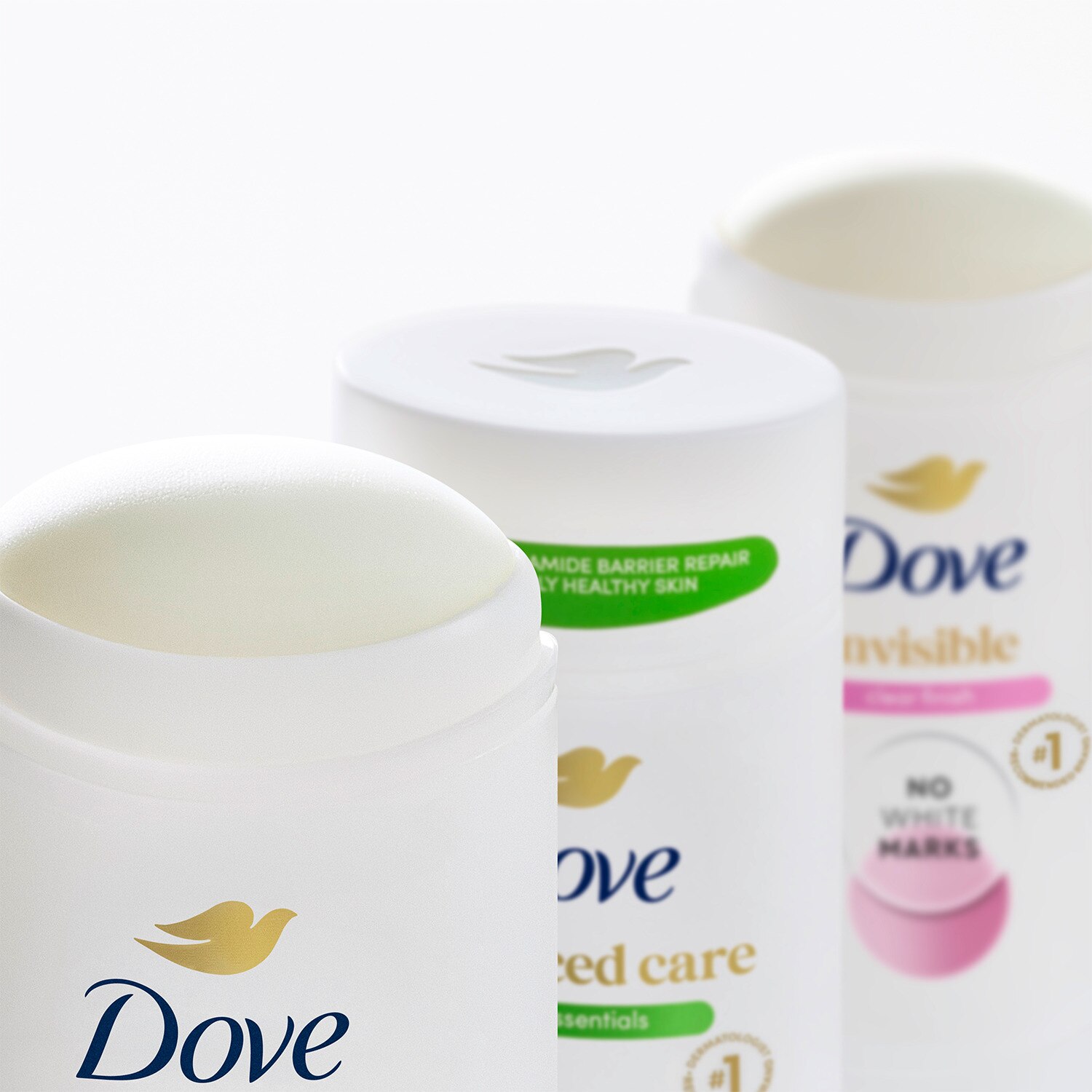 The tops of Dove Advanced Care deodorant sticks 