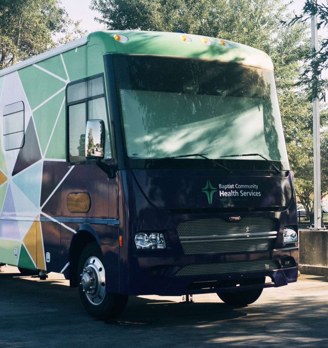 A colorful van that serves as a mobile health clinic