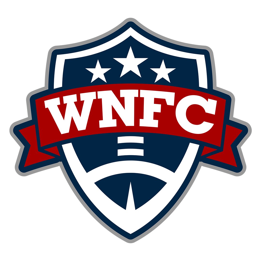 Three girls standing on a court wearing "Got Her Back Football Camp" t-shirts bumping their fists in the air with smiles on their faces