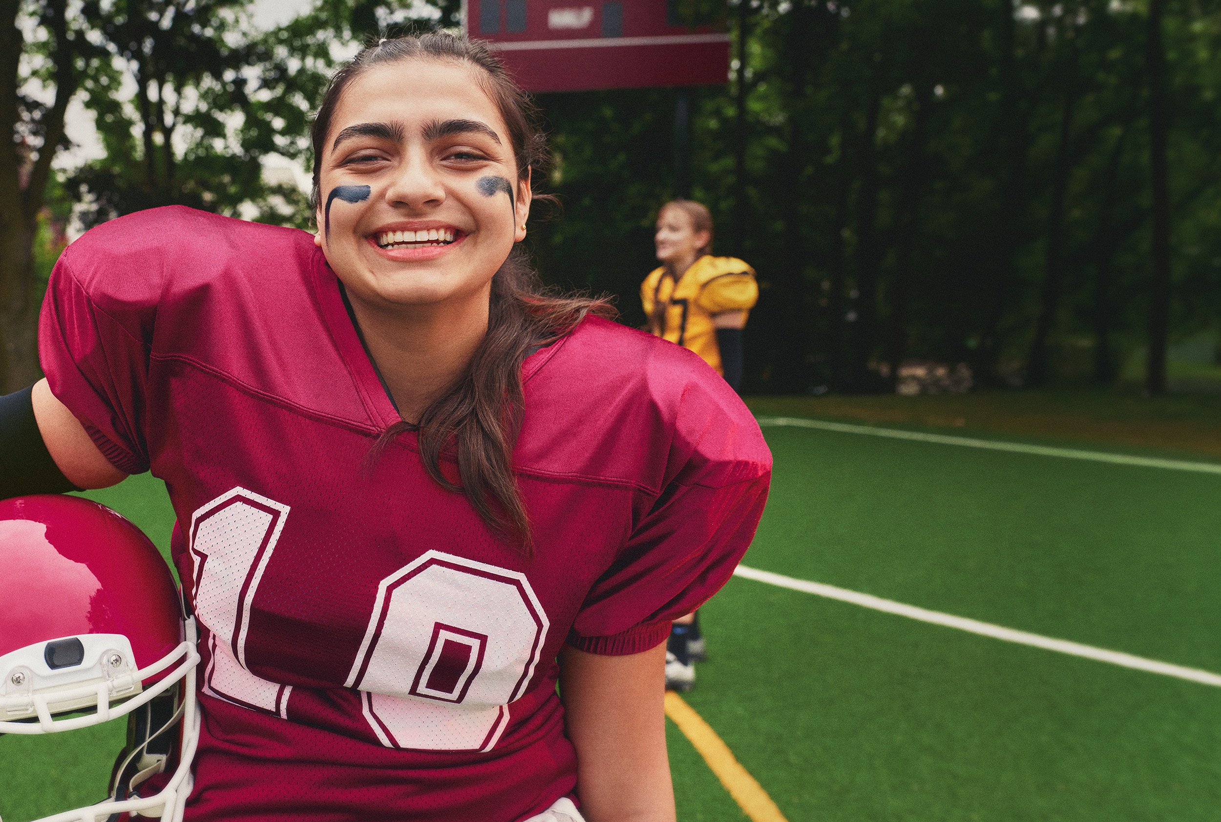 Girl smiling on track field