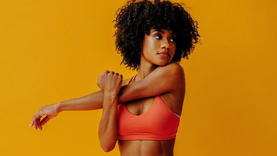 Young woman in her sports gear free from clogged sweat glands