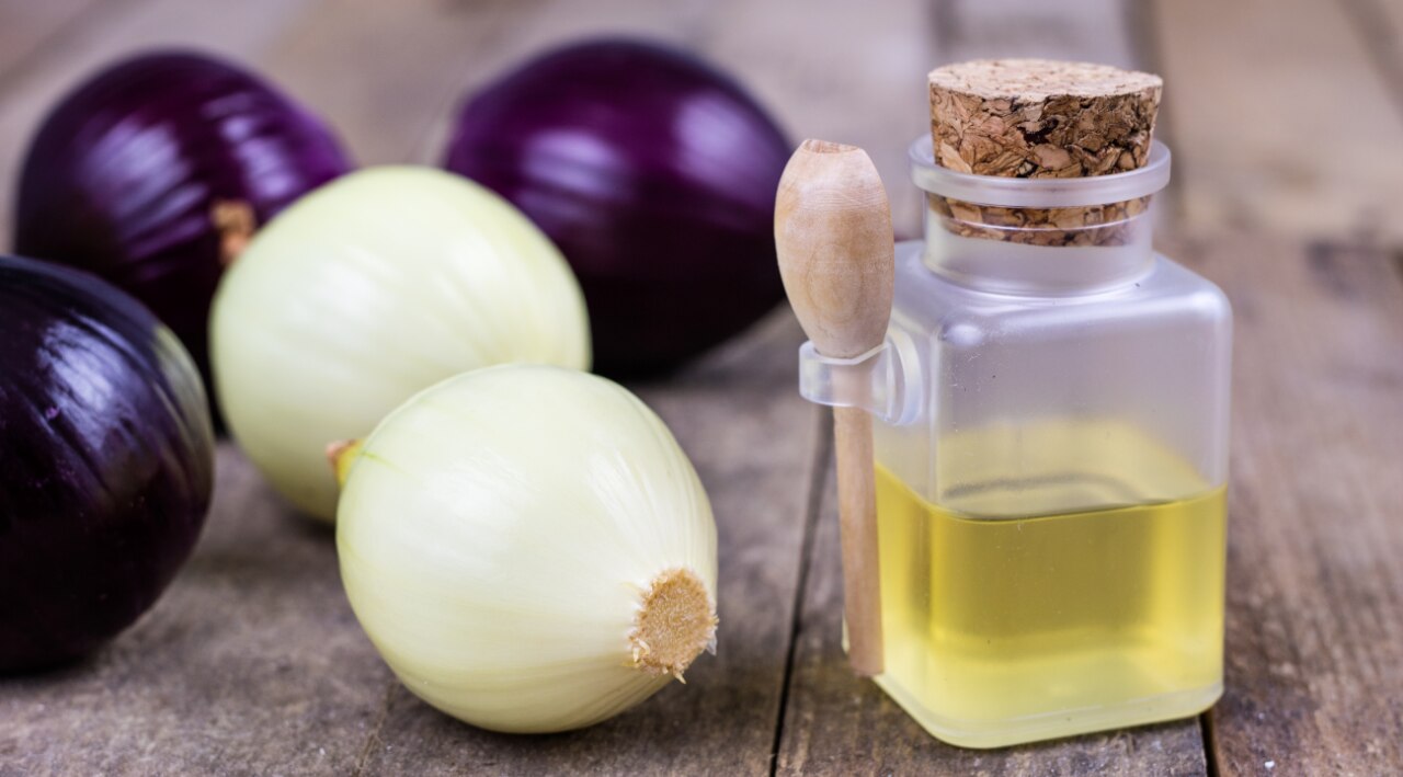 2. Onion Juice + Oil (Coconut or Olive)
