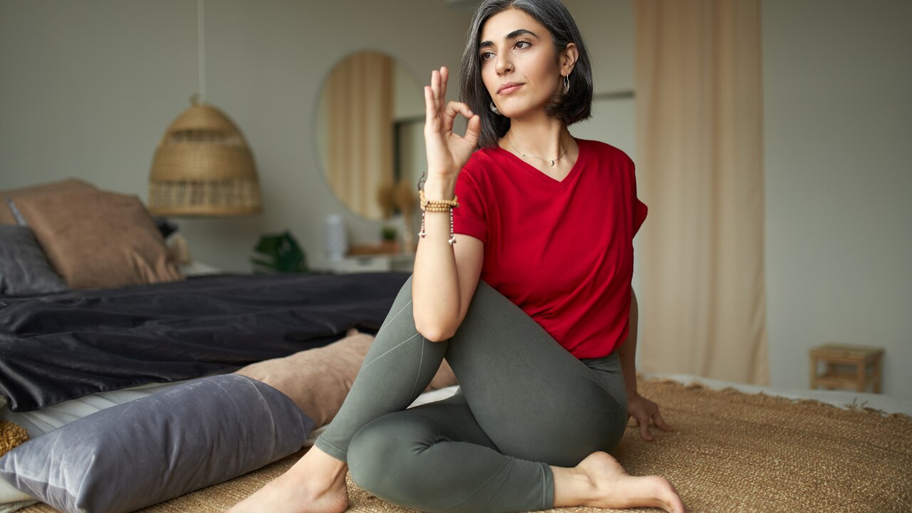 9. Ardha Matsyendrasana (Half Lord of the Fishes Pose)