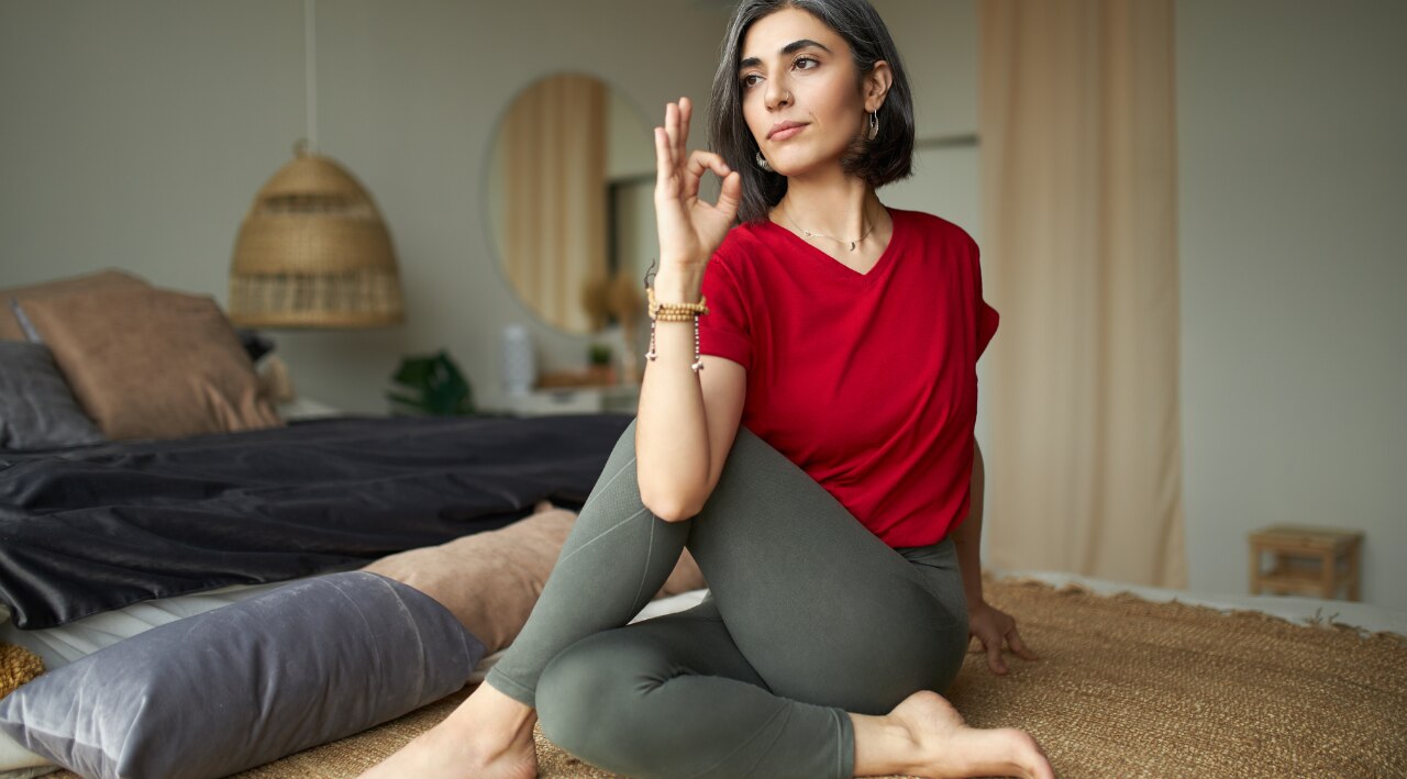 9. Ardha Matsyendrasana (Half Lord of the Fishes Pose)