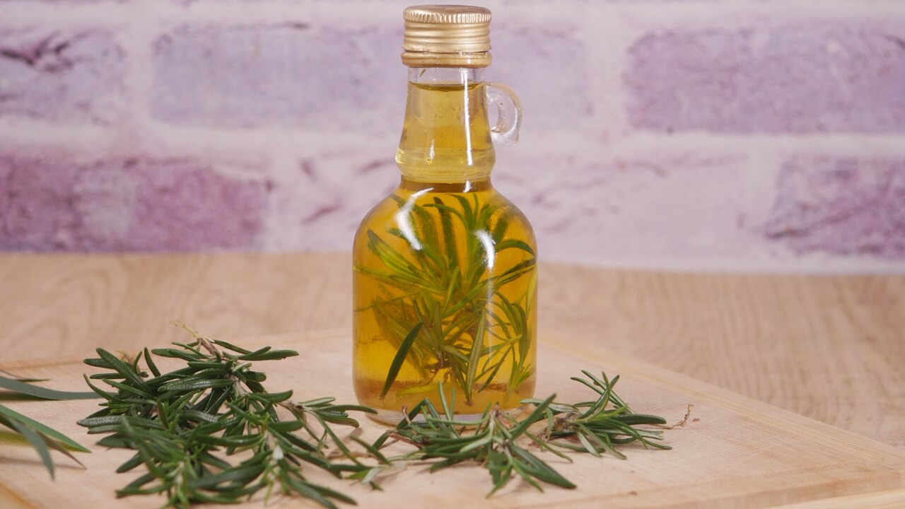 1. Rosemary Oil & Carrier Oil Massage