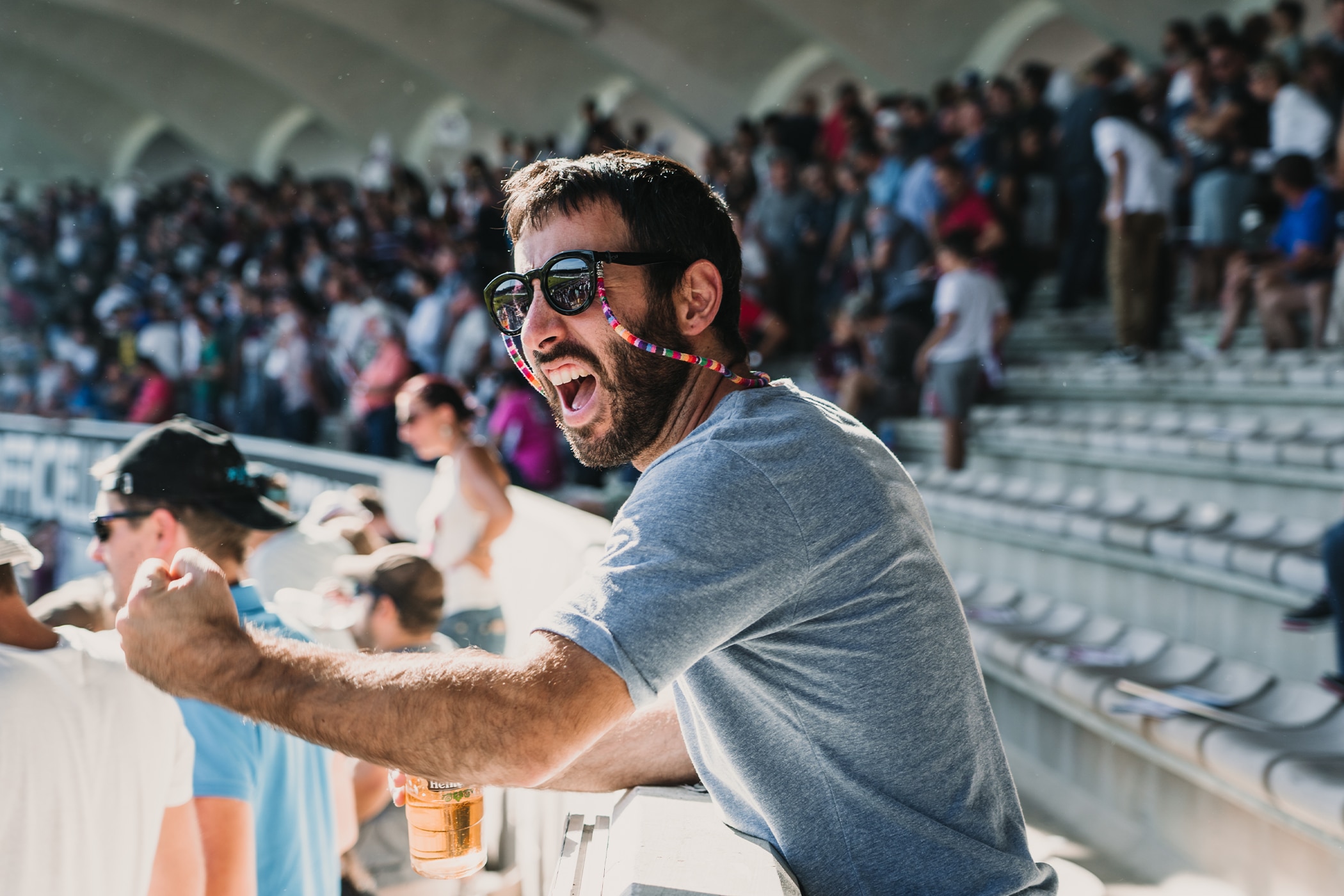 Man wearing deodorant and supporting his team at a World Cup game he’s traveled to