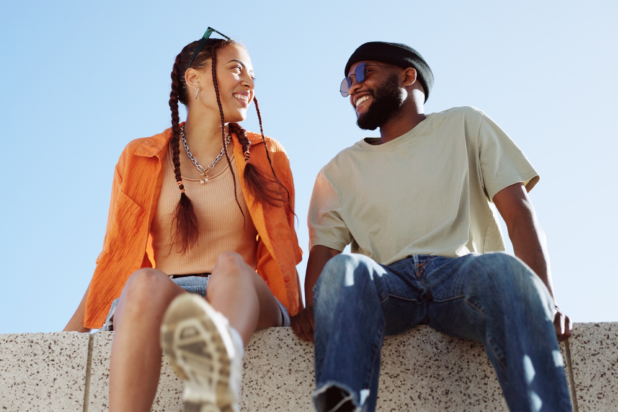  Young couple enjoying a hot day outside with zero sign of summer sweat 