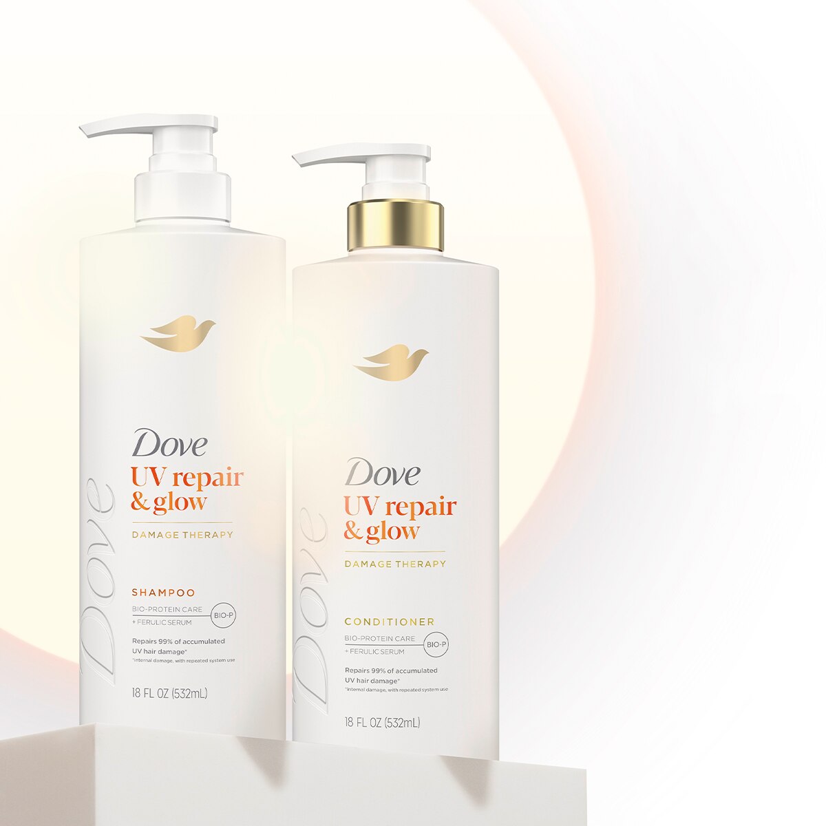 UV repair shampoo and conditioner standing against white background