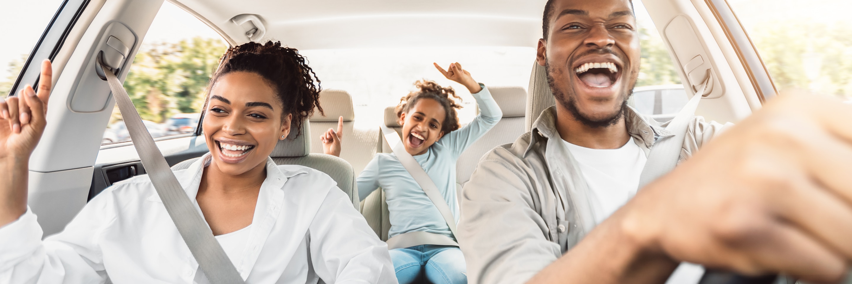 Happy family on a road trip