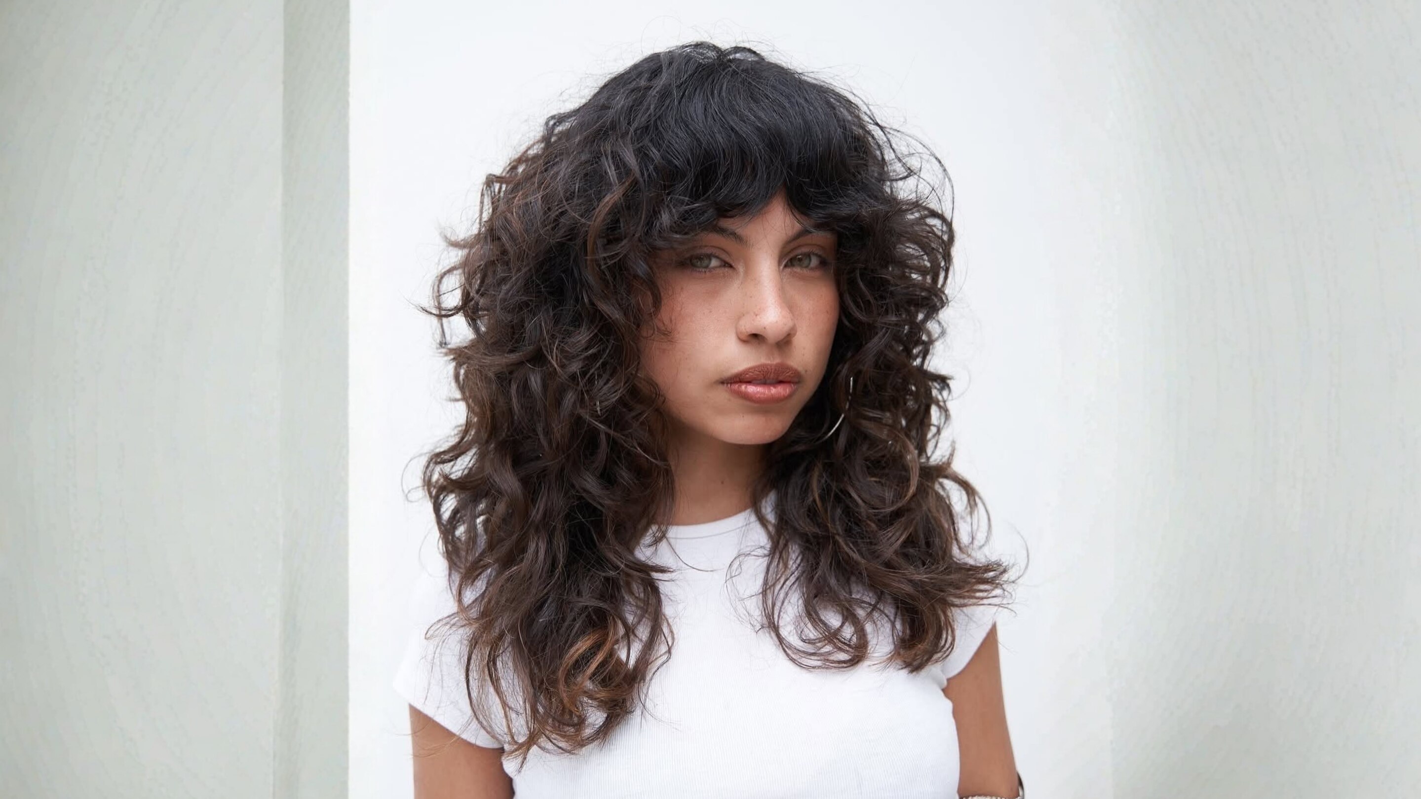 12. Curly Wolf Cut