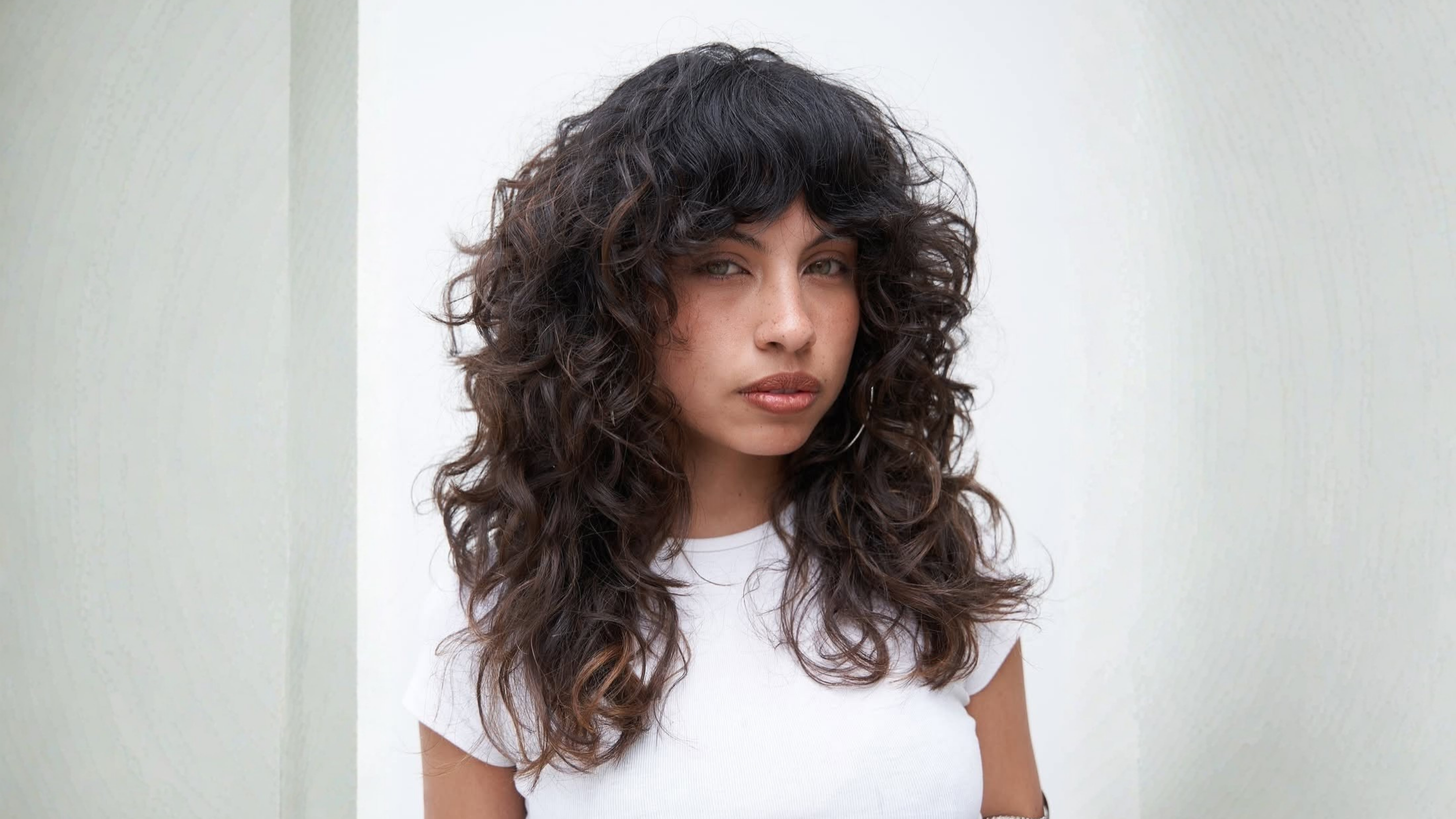 12. Curly Wolf Cut