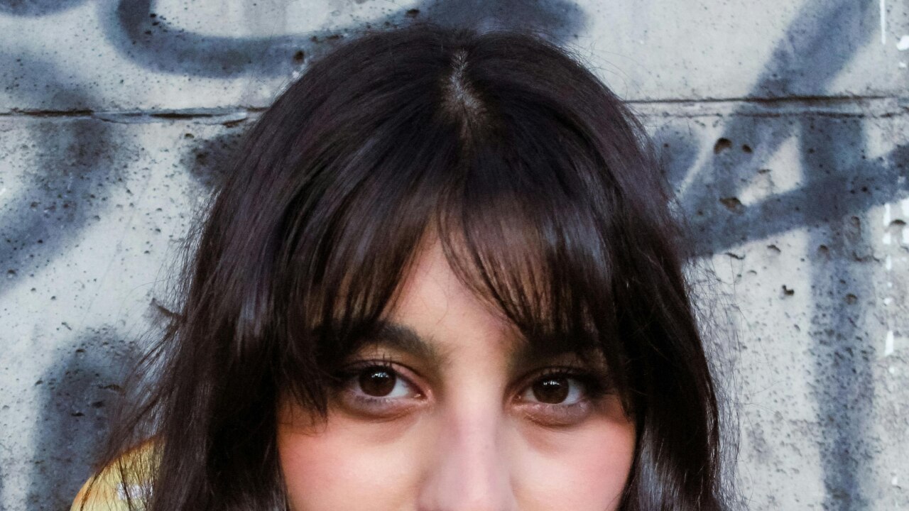 DON'T: Let Humidity Flatten Your Front Bang Hairstyle