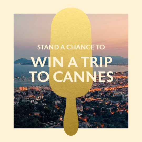 Magnum promotion featuring a gold ice cream bar silhouette over Cannes at sunset. Text reads: Stand a chance to win a trip to Cannes.